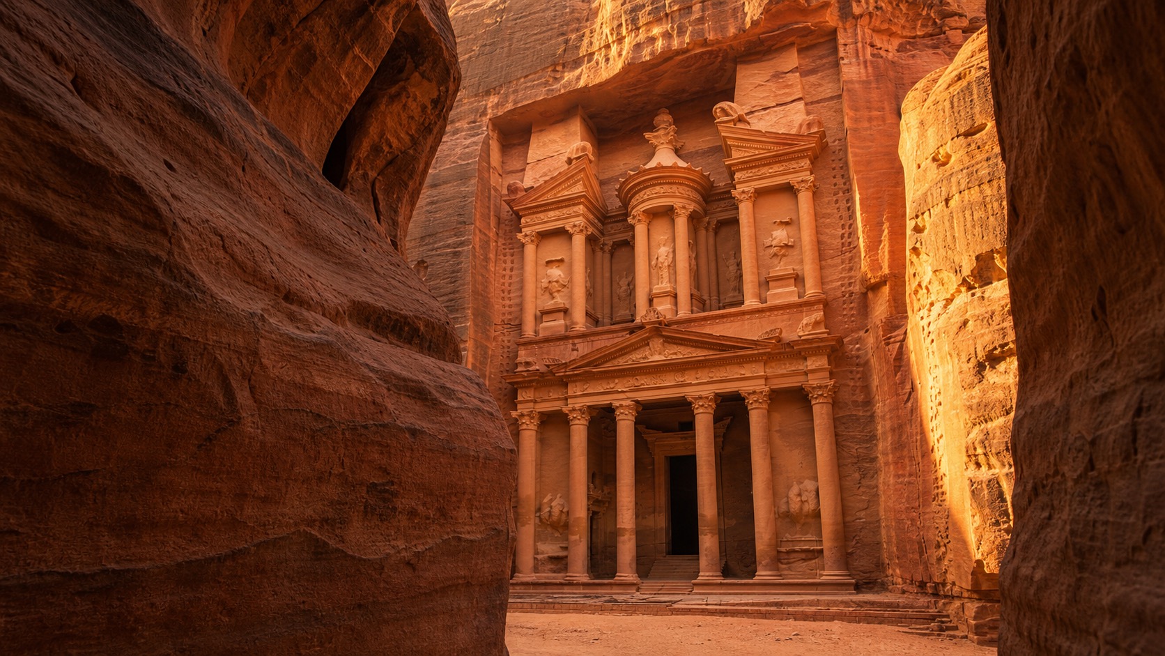 The Treasury in Petra carved into rose-colored sandstone