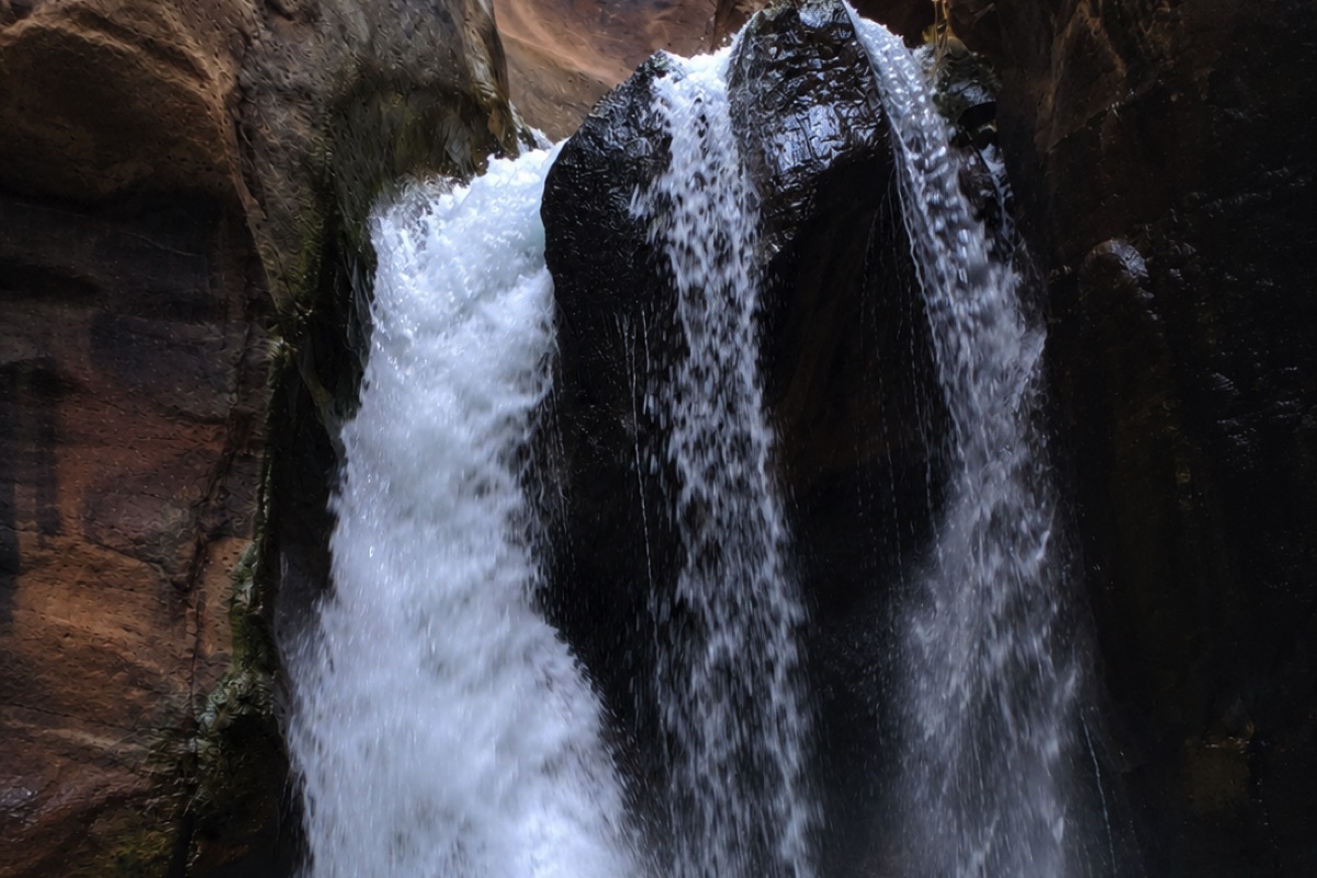 The famous waterfall at the end of the Wadi Al Mujib Siq Trail in Jordan.